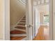 Wooden staircase leading to the upper level at 806 E Franklin St, Chapel Hill, NC 27514