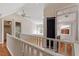 Upper level features a spacious bedroom with built-in shelving and hardwood floors at 806 E Franklin St, Chapel Hill, NC 27514