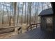 Wooden deck overlooks a wooded backyard at 810 Mountain Creek Rd, Chapel Hill, NC 27516