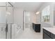 Bathroom featuring double vanities, soaking tub and a glass shower door at 812 Abbyberry Dr, Wake Forest, NC 27587