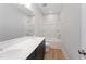 Bathroom featuring double sink vanity and combination tub and shower at 812 Abbyberry Dr, Wake Forest, NC 27587