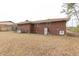 Large backyard with mature trees surrounding the home at 1113 W Mount Dr, Rocky Mount, NC 27803
