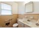 Bathroom with beige tile and a modern toilet at 1113 W Mount Dr, Rocky Mount, NC 27803