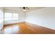 Bright bedroom with hardwood floors and ceiling fan at 1113 W Mount Dr, Rocky Mount, NC 27803