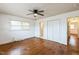 Hardwood floor bedroom with double closets and access to bathroom at 1113 W Mount Dr, Rocky Mount, NC 27803