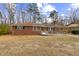 Brick ranch house with ramp access and a spacious yard at 1113 W Mount Dr, Rocky Mount, NC 27803