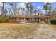 Brick ranch house with ramp access and a spacious yard at 1113 W Mount Dr, Rocky Mount, NC 27803