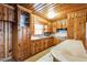 Kitchen with wood cabinets and a retro countertop at 1113 W Mount Dr, Rocky Mount, NC 27803