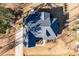 Aerial view of a house with dark roof, driveway and yard at 1141 Barley Stone Way, Raleigh, NC 27603