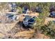 Aerial view of the property, showing the house, backyard, and surrounding neighborhood at 1141 Barley Stone Way, Raleigh, NC 27603