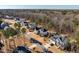 Community aerial view with mature trees and well-maintained homes in a quiet neighborhood at 1141 Barley Stone Way, Raleigh, NC 27603