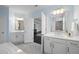 Luxurious bathroom with dual vanities, marble countertops, and modern fixtures at 1141 Barley Stone Way, Raleigh, NC 27603