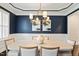 Elegant dining room with sophisticated decor and a modern chandelier at 1141 Barley Stone Way, Raleigh, NC 27603