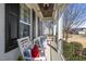 Comfortable front porch with seating, ideal for relaxing and enjoying the outdoors at 1141 Barley Stone Way, Raleigh, NC 27603