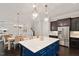 Gourmet kitchen with stainless steel appliances and central island at 1141 Barley Stone Way, Raleigh, NC 27603
