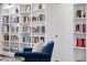 Bright Living room shows custom built-ins, library, and furnishings at 1141 Barley Stone Way, Raleigh, NC 27603