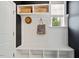 Welcoming mudroom with storage benches and shelves at 1141 Barley Stone Way, Raleigh, NC 27603
