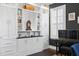 Stylish home office with custom built-ins, plantation shutters, and a piano at 1141 Barley Stone Way, Raleigh, NC 27603