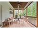 Comfortable screened porch with neutral decor, wood ceiling and views at 1141 Barley Stone Way, Raleigh, NC 27603