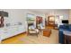Inviting living room featuring hardwood floors, fireplace, and stylish furniture perfect for relaxing or entertaining at 1205 Glen Eden Dr, Raleigh, NC 27612