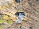 Aerial view of a property surrounded by trees, showcasing its secluded location at 125 Sue-Kim Dr, Youngsville, NC 27596