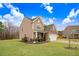 Traditional home with a two car garage, front yard, and mature landscaping at 130 Daniel Farm Dr, Benson, NC 27504