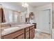 Main bathroom features double sinks, granite countertops, and a large mirror at 130 Daniel Farm Dr, Benson, NC 27504