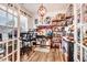 Bright office space with a large window, custom shelving, and ample storage for a productive work environment at 130 Daniel Farm Dr, Benson, NC 27504