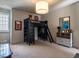 Spacious bedroom with a loft bed, desk, and dresser for storage and organization at 1324 Brooks Ave, Raleigh, NC 27607