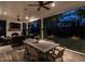 Charming outdoor space featuring an outdoor dining area, fireplace, and views of the backyard at 1324 Brooks Ave, Raleigh, NC 27607