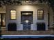 Well-equipped outdoor kitchen with stainless steel grill, surrounded by elegant plantings at 1324 Brooks Ave, Raleigh, NC 27607
