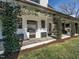 Inviting outdoor kitchen with built-in grill, surrounded by lush greenery, perfect for alfresco dining at 1324 Brooks Ave, Raleigh, NC 27607