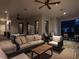 Spacious covered patio featuring comfortable seating, ceiling fans, and an outdoor dining area at 1324 Brooks Ave, Raleigh, NC 27607