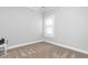 Simple bedroom with neutral walls and carpeting at 2242 Colorado Dr, Graham, NC 27253