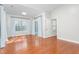 Bedroom with hardwood floors, sliding glass doors and light colors at 2242 Colorado Dr, Graham, NC 27253