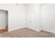 Bright bedroom with neutral carpeting and double-door closet at 2242 Colorado Dr, Graham, NC 27253