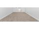 Large bonus room with neutral carpeting at 2242 Colorado Dr, Graham, NC 27253