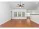 Spacious dining area with hardwood floors and ceiling fan at 2242 Colorado Dr, Graham, NC 27253