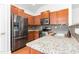 Modern kitchen features stainless steel appliances and granite countertops at 2242 Colorado Dr, Graham, NC 27253