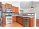 Well-equipped kitchen featuring stainless steel appliances and granite countertops at 2242 Colorado Dr, Graham, NC 27253
