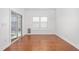 Bright sunroom with hardwood floors and sliding glass doors at 2242 Colorado Dr, Graham, NC 27253