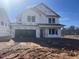 New construction home with house wrap still on at 246 Tidal Pool Way, Cary, NC 27519