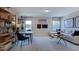 Game room features a comfortable sectional sofa, a desk, and plenty of shelving at 246 Tidal Pool Way, Cary, NC 27519
