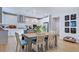 Modern kitchen with white cabinets and stainless steel appliances at 246 Tidal Pool Way, Cary, NC 27519