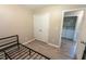 Bedroom with double doors leading to laundry closet at 248 Southgate Dr, Garner, NC 27529