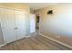 Spacious bedroom with double doors and laminate flooring at 248 Southgate Dr, Garner, NC 27529