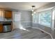 Cozy dining area with bay window and hardwood floors at 248 Southgate Dr, Garner, NC 27529