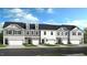 New townhome community with 4 units, 2-car garages, and attractive exterior finishes at 265 Sweetbay Tree Dr, Wendell, NC 27591