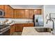 Modern kitchen with stainless steel appliances and granite countertops at 265 Sweetbay Tree Dr, Wendell, NC 27591