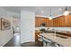 Open concept kitchen with island and stainless steel appliances at 265 Sweetbay Tree Dr, Wendell, NC 27591